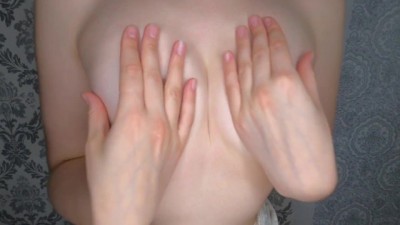 Busty Brunette Teases with Oiled Nipples and Sensual Play